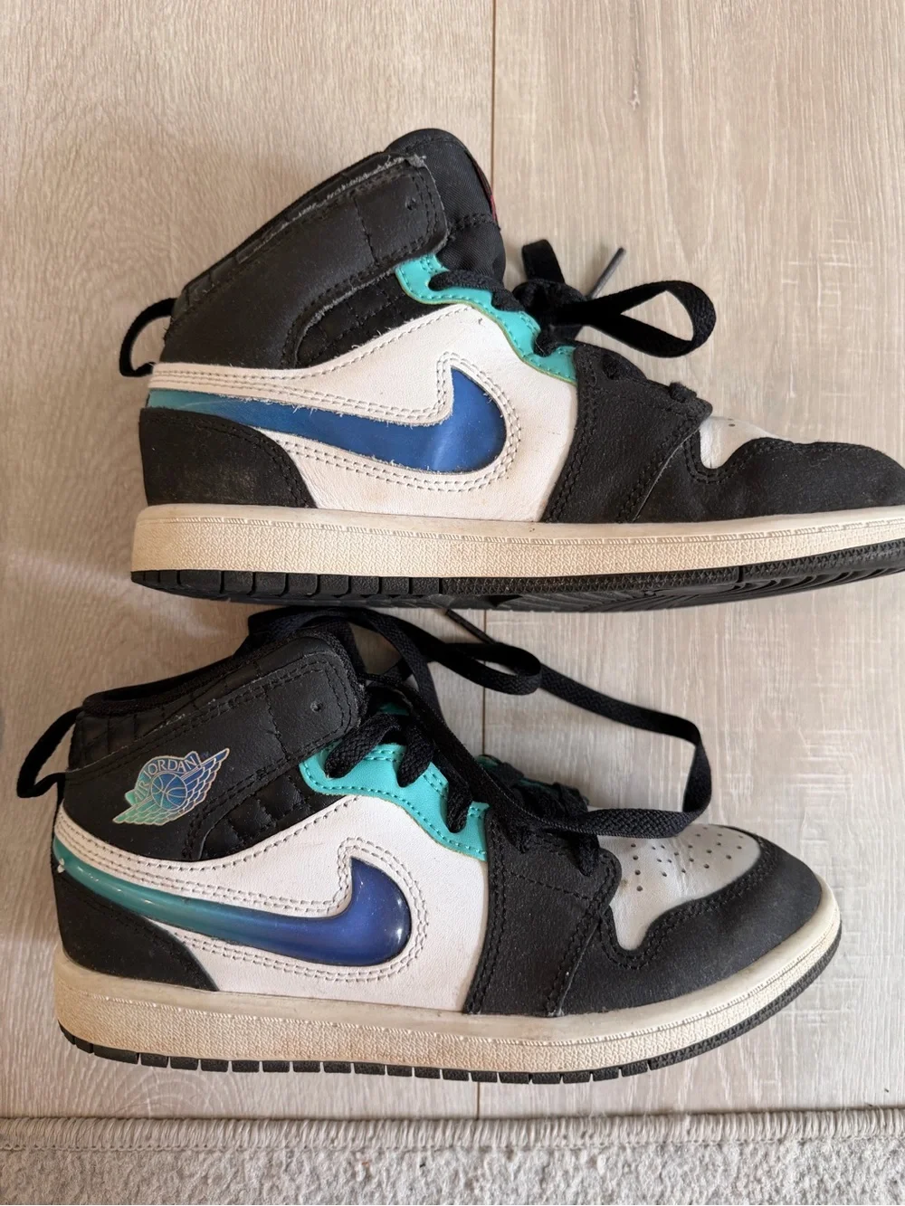 Nike Kids Black White Blue High-Top Sneakers with Teal Accents